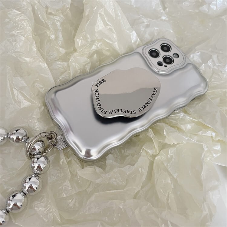 Coque coussin d'air avec bracelet en perles argentées mates pour iPhone 